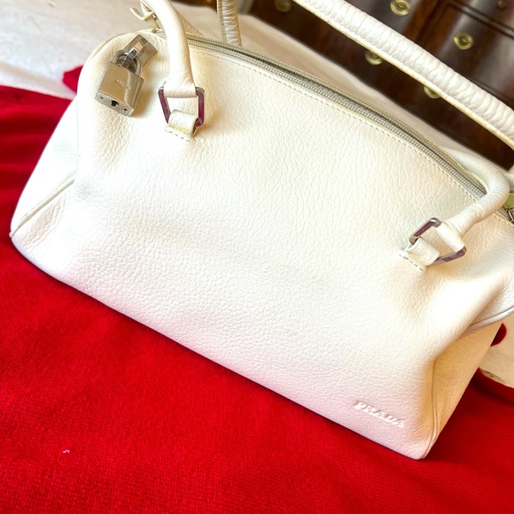 Prada leather bag ivory with lock & key hand bag no odor pristine condition.✨ - Picture 1 of 5